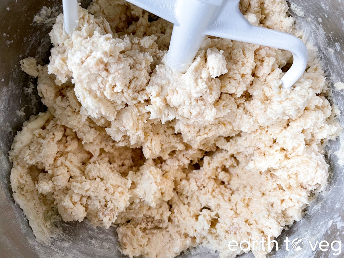 Mixed cookie dough in a kitchenaid mixer.