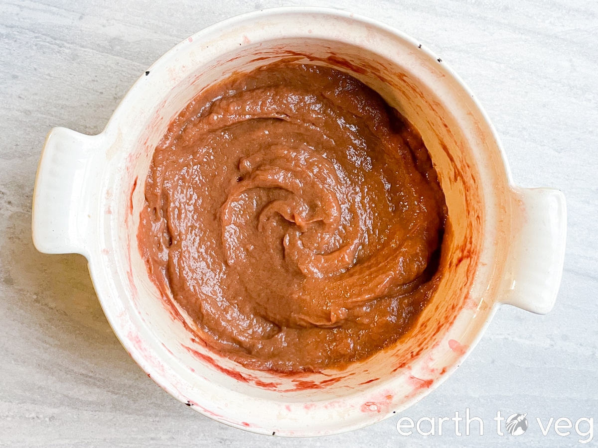 a large pot full of reduced, cooked rhubarb butter.