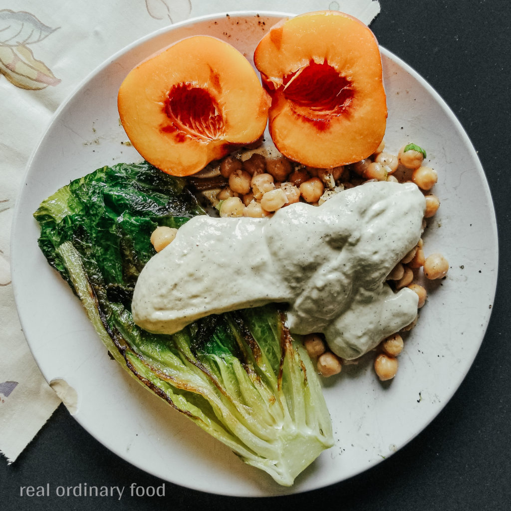 grilled romaine caesar salad with herby chickpeas and peach