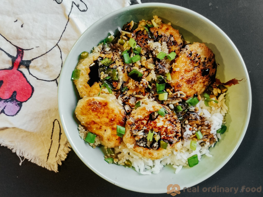 crunchy tube tofu with scallions, drizzled with dark soy sauce and served over steamed rice