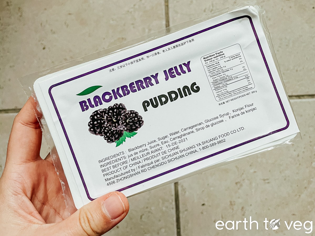 A fake tub of blackberry jelly pudding.