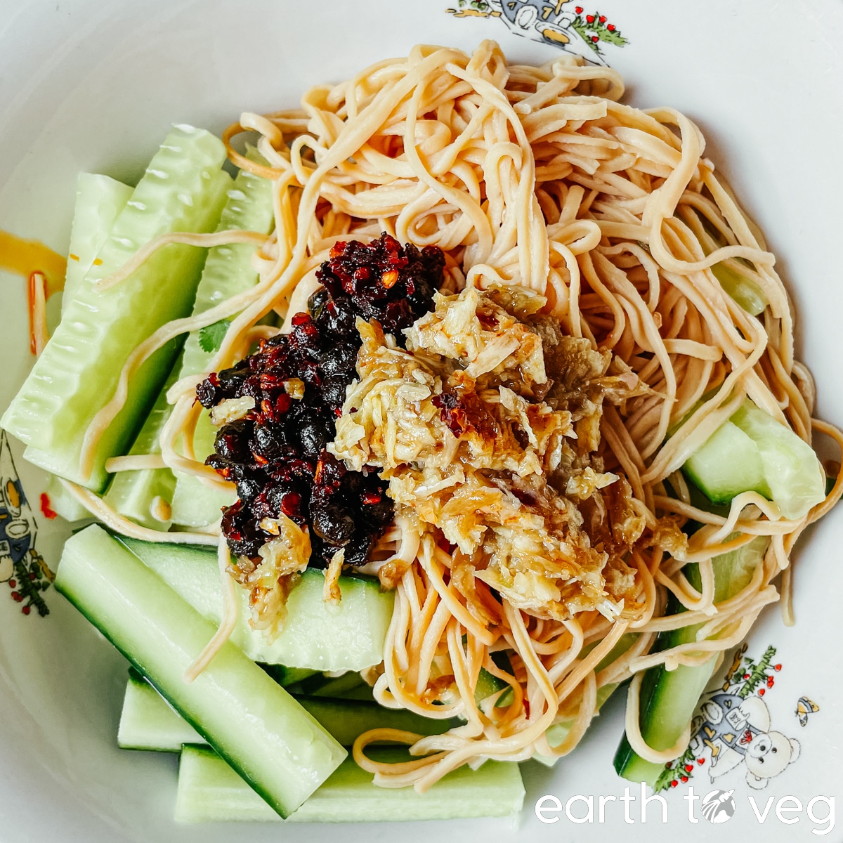 Crushed garlic is added to the bean curd salad bowl.