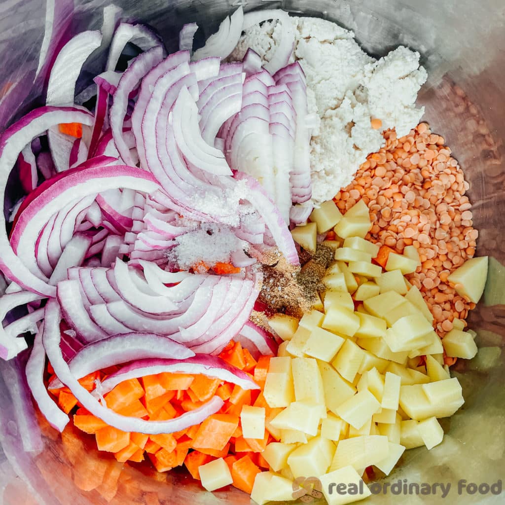 Chopped and prepped lentil soup ingredients in an Instant Pot.