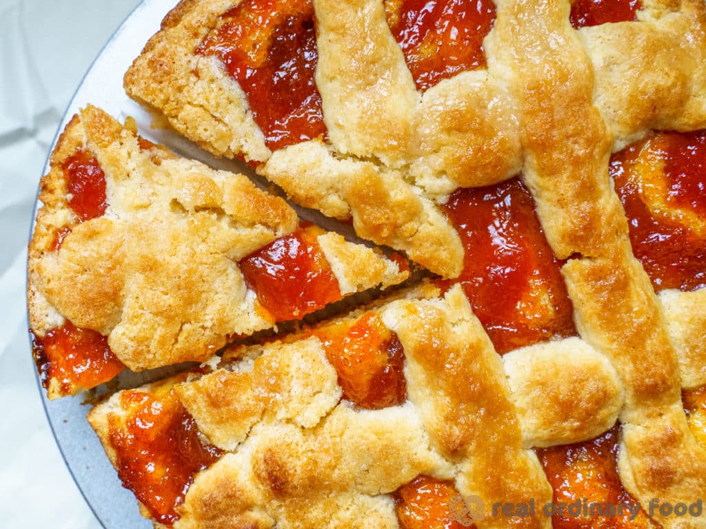 slice of armenian perok cake with apricot jam
