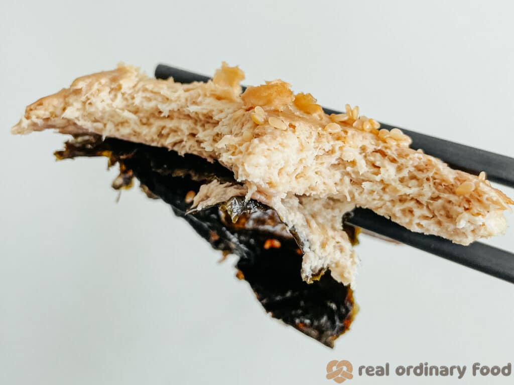 chopsticks holding vegan unagi BBQ eel