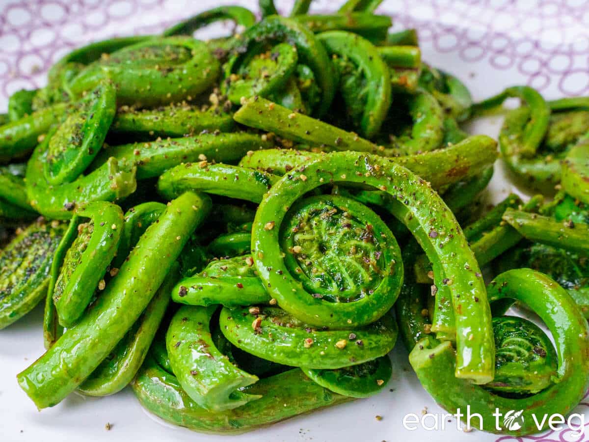 Fiddleheads sauteed in lemon butter.