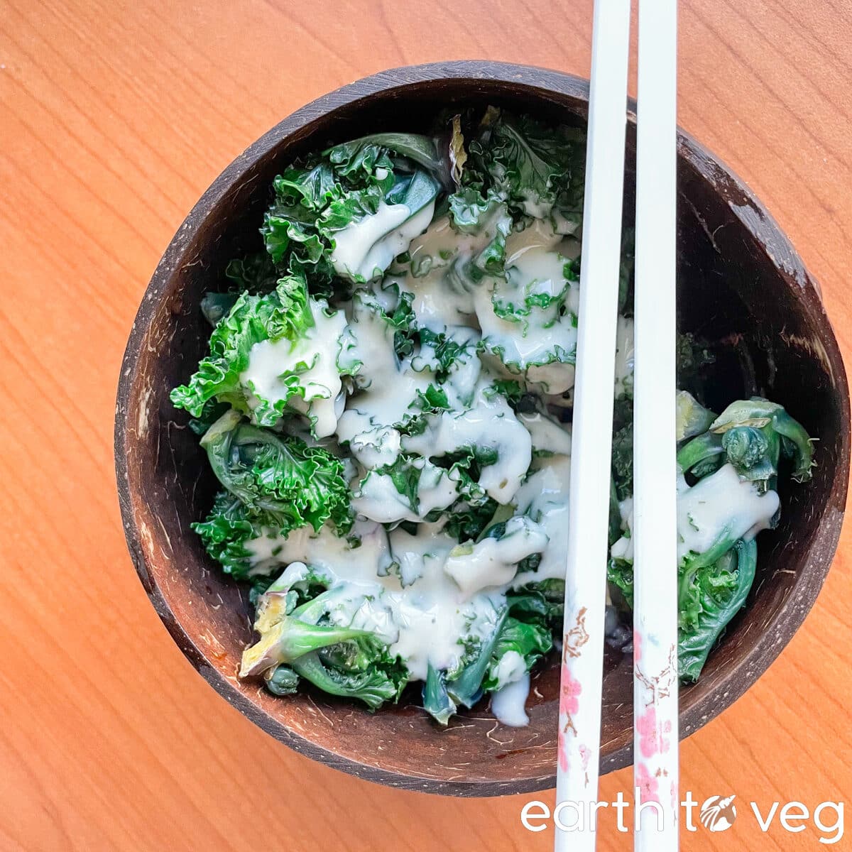steamed kalettes with salad dressing