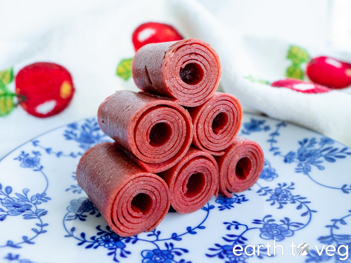 A stack of six rolls of Chinese hawthorn leather on a blue china plate.
