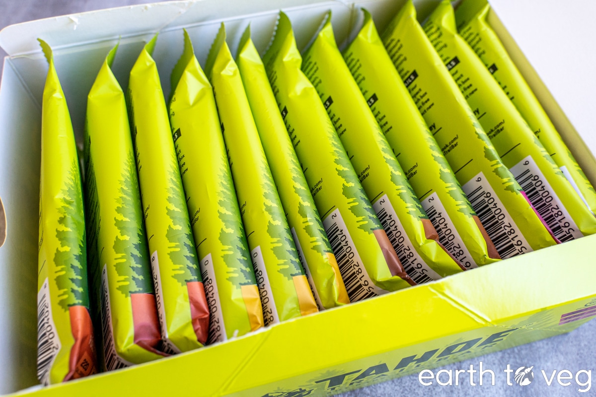 A variety box of 12 Tahoe Trail Bars in their original packaging, on a grey countertop.
