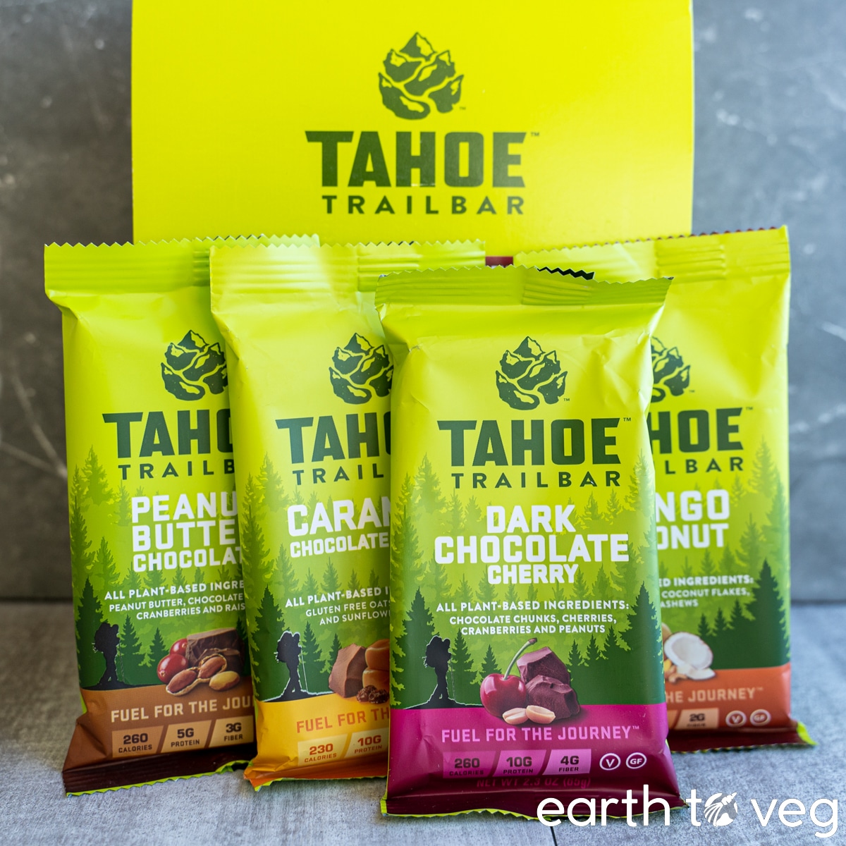 The four flavours of Tahoe Trail Bars on a grey counter, with the Tahoe box in the background.