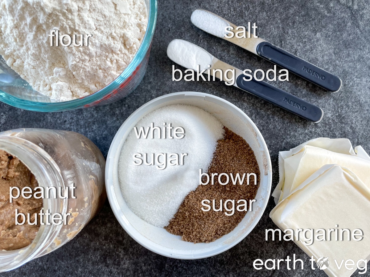 Ingredients for vegan peanut butter cookies on a grey countertop.