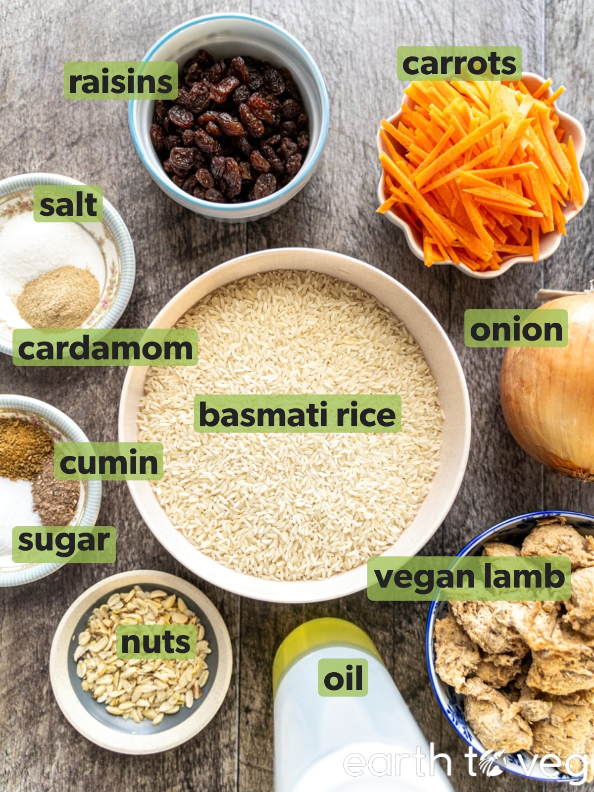 Ingredients for vegan Kabuli Pulao are laid out on a grey countertop.