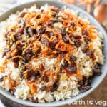Vegetarian Kabuli Palaw piled up on a large grey plate.