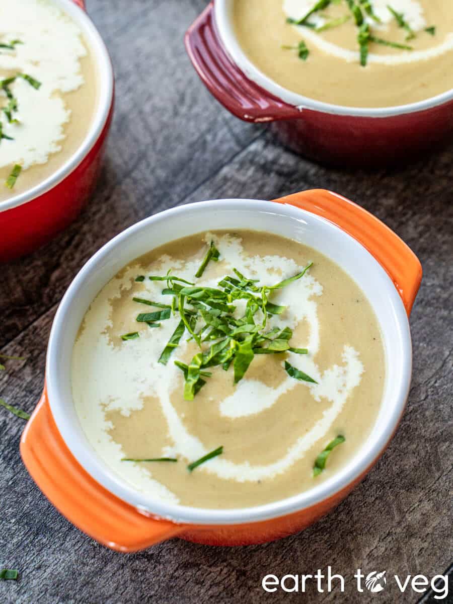 Marrow soup with vegan cream drizzled over top.