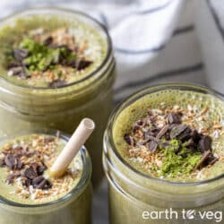 Chocolate matcha protein shakes in glass jars.