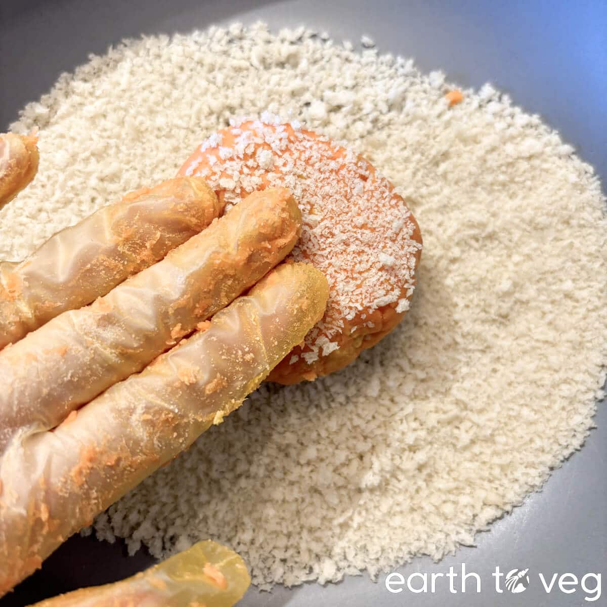 The pumpkin cakes are pressed into panko breadcrumbs.