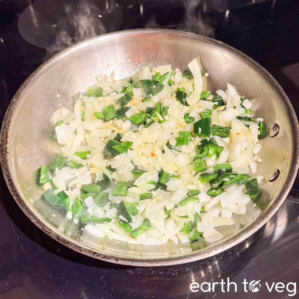 Saute onions and garlic in oil.