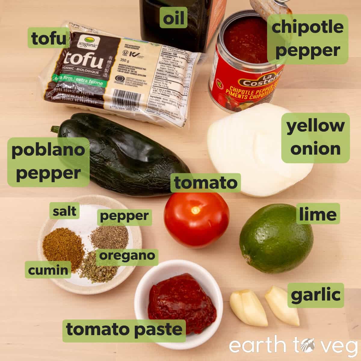 Ingredients for tofu sofritas on a wooden table.