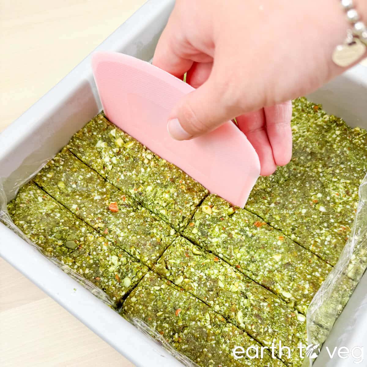 The matcha date bars are sliced into evenly sized rectangles.