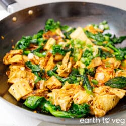 Tofu skin stir fry with wilted greens.