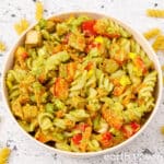A bowl of oil-free avocado pasta salad with smoked tofu.