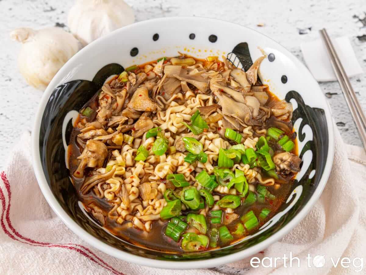 Maitake mushroom noodle soup in a ramen bowl.