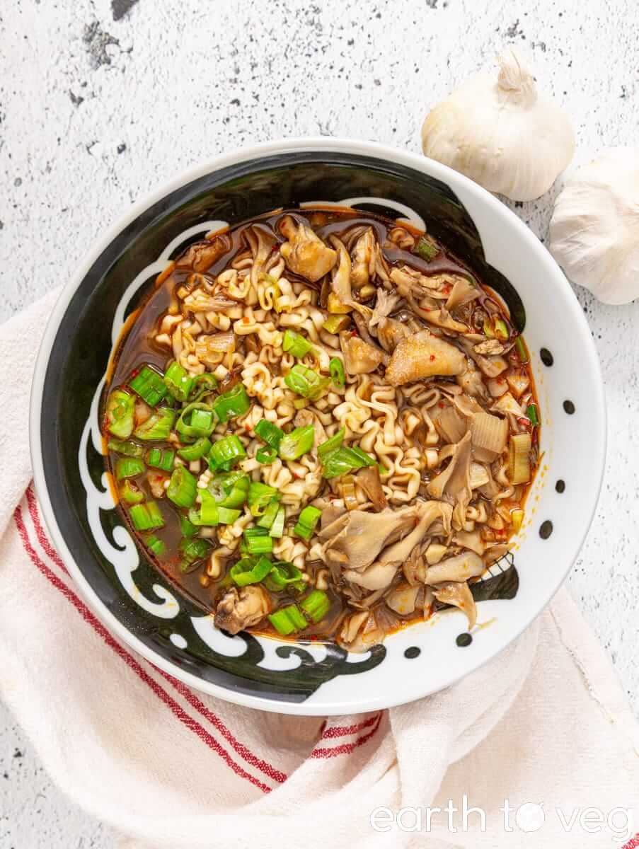 Maitake ramen bowl on a white countertop.