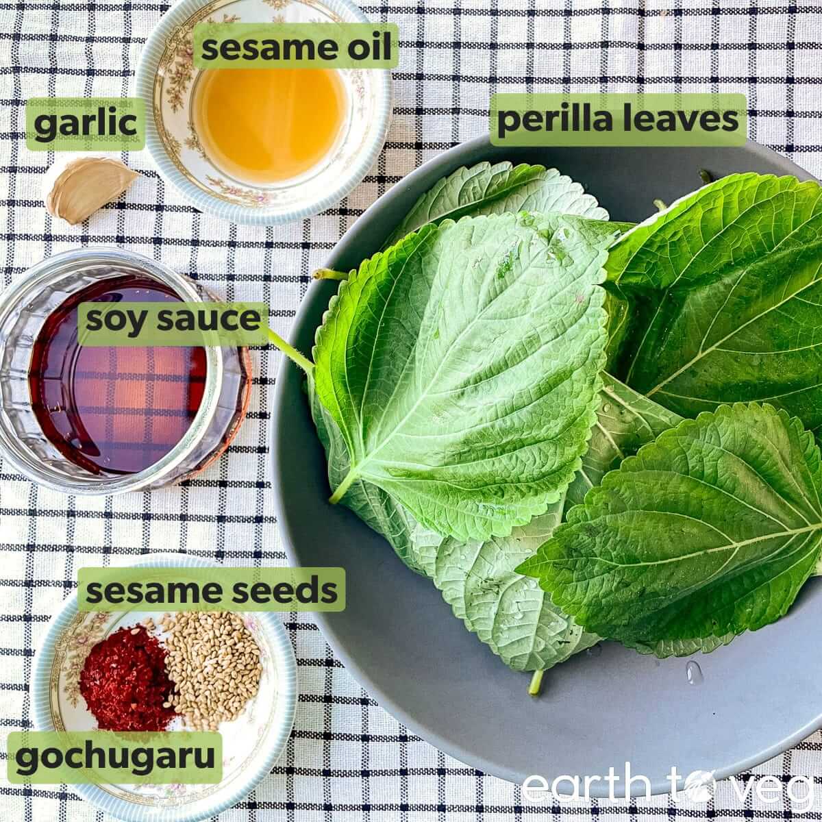 Ingredients for kkaennip jjim on a gingham tablecloth.