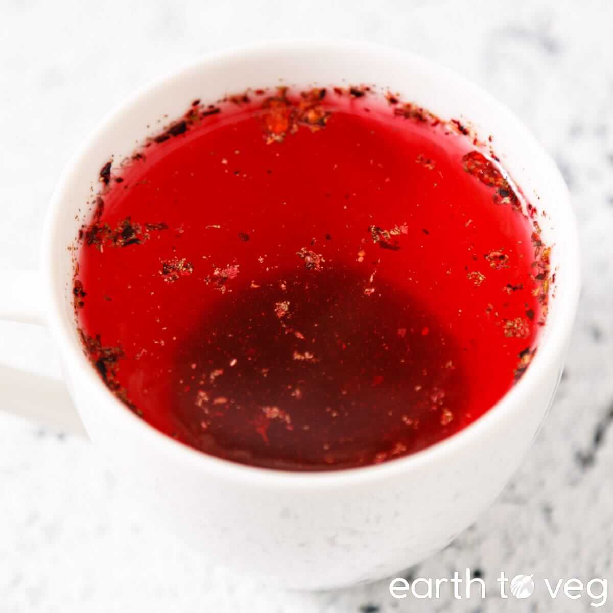 White mug filled with Turkish pomegranate tea.