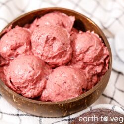 Scoops of homemade berry avocado sorbet in a bowl.